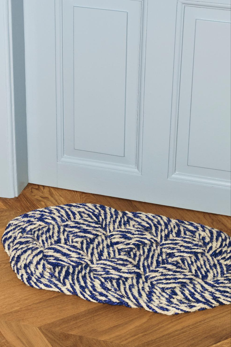 Coco Swirl dørmåtte, blå/råhvid - B40 x L80 cm.